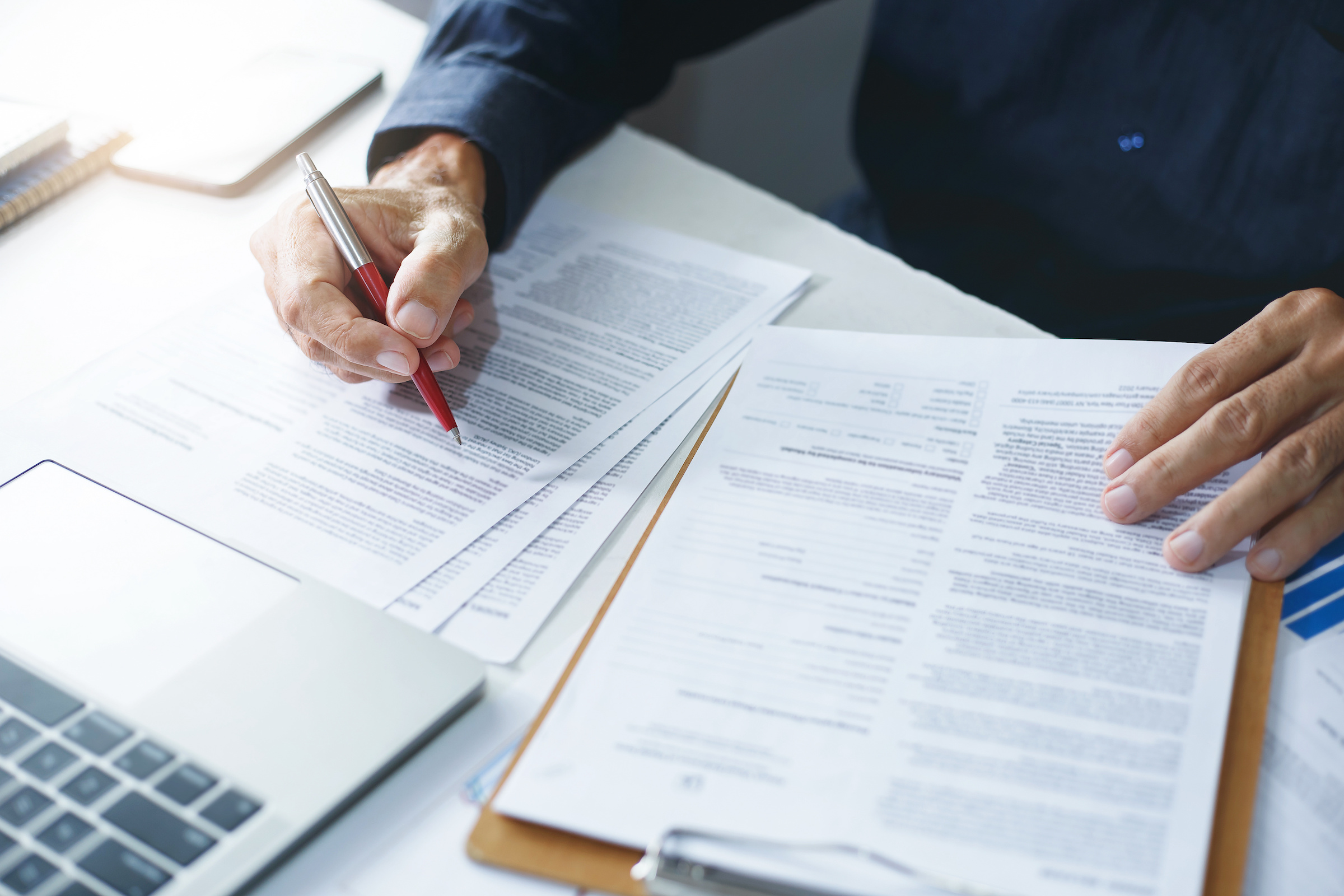 Financial Documents Being Reviewed on a Table